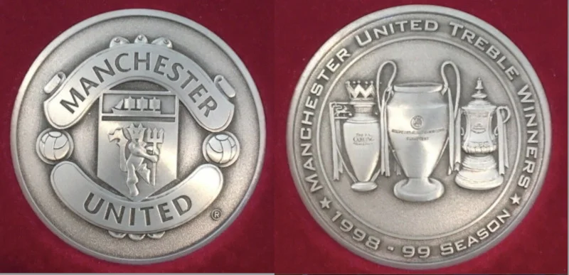 A Treble of Coins Commemorating Manchester United's Greatest